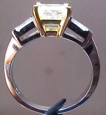 yellow diamond ring with double baguettes