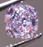 This diamond has a delicious light purple pink color- very apparent, and quite lovely. Pink is quite rare in diamonds, and very very special. The color manifests itself in a different way than the shade of Yellow for example.